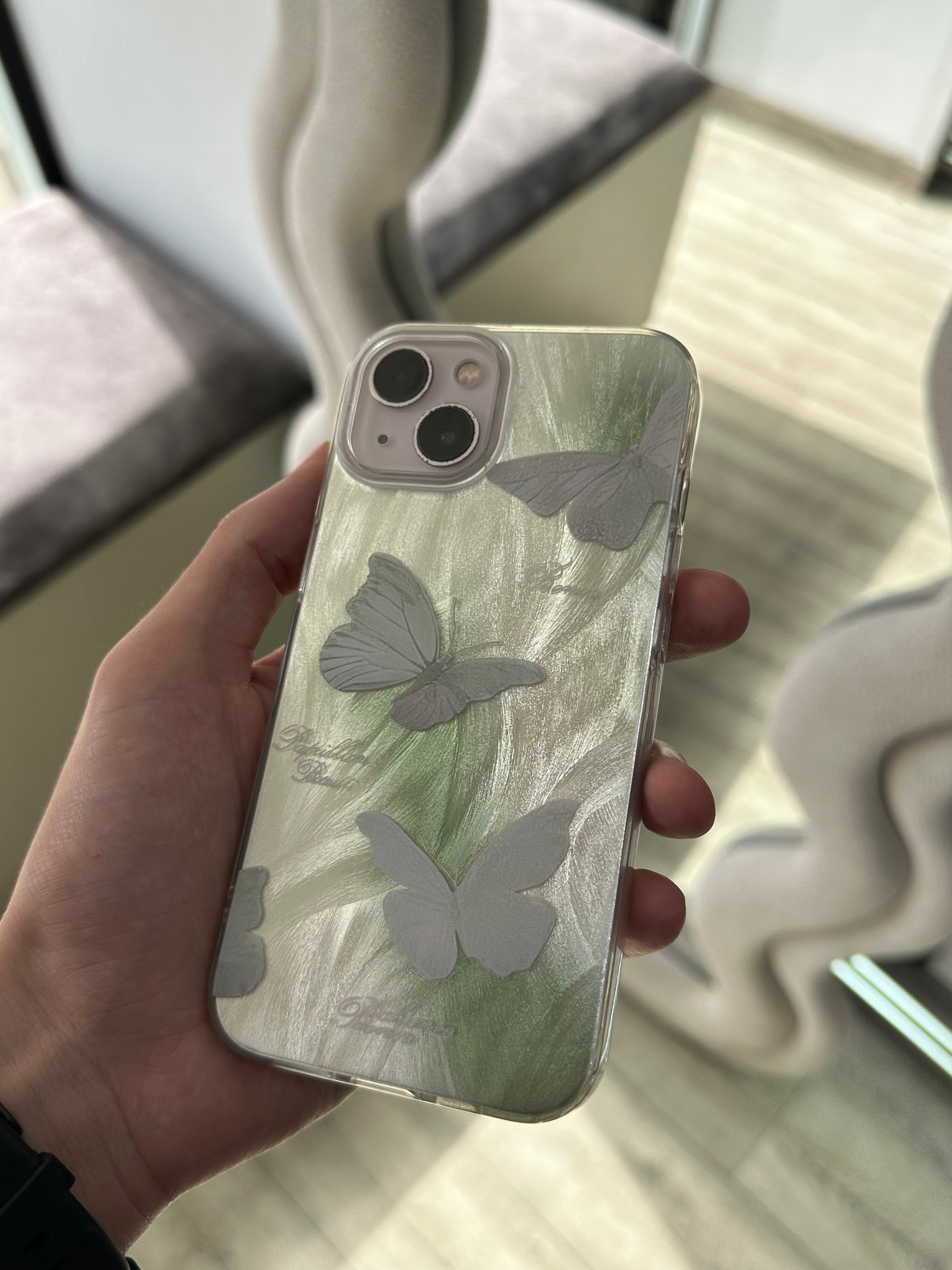 Coque papillon vert