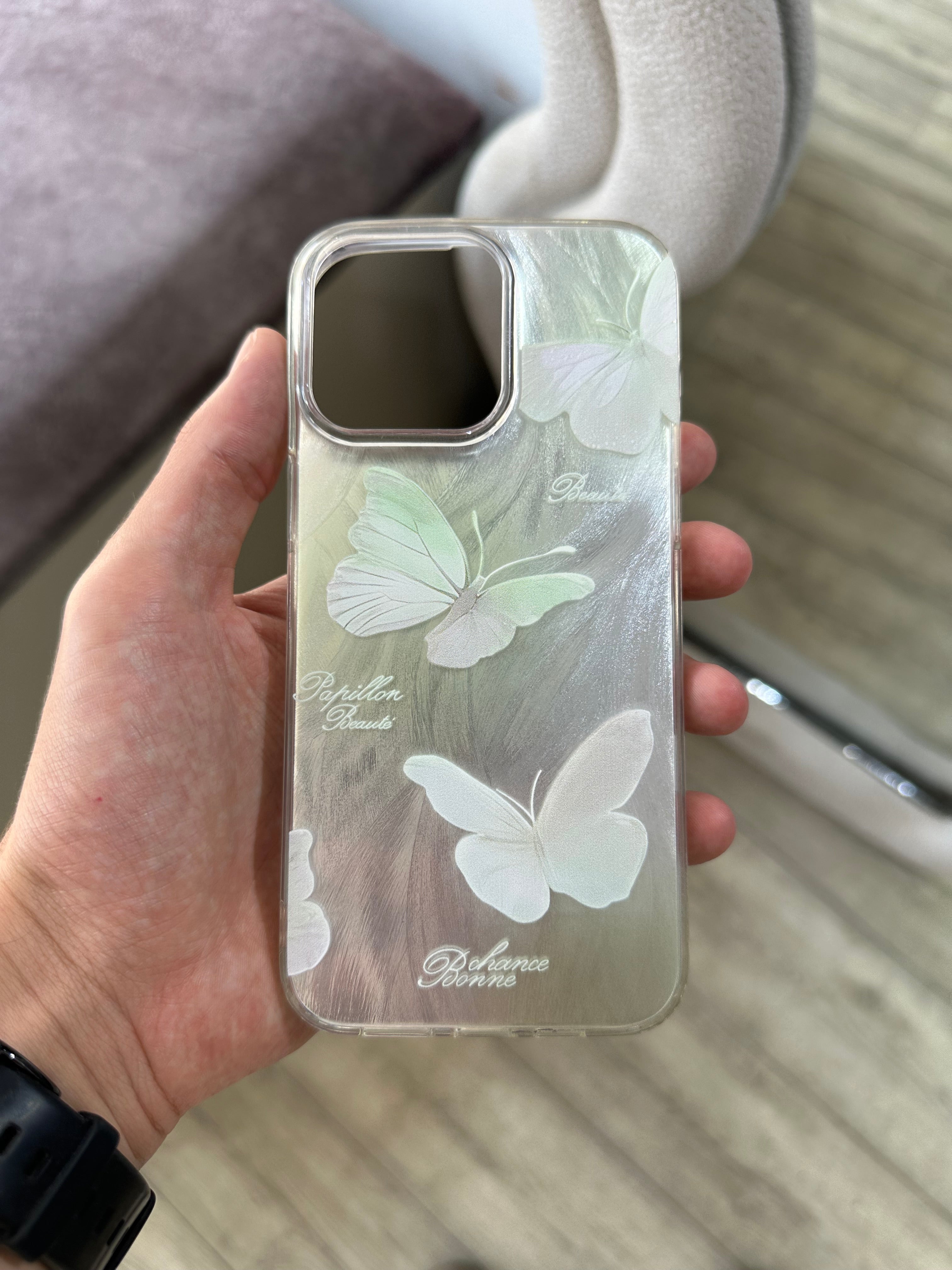 Coque papillon vert